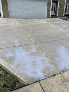Close up of new concrete driveway poured by Mynor Concrete